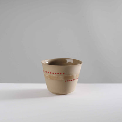 v shape - macadamia nut/red dots