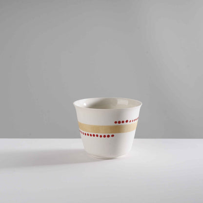 v shape - macadamia nut/red dots