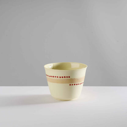 v shape - macadamia nut/red dots